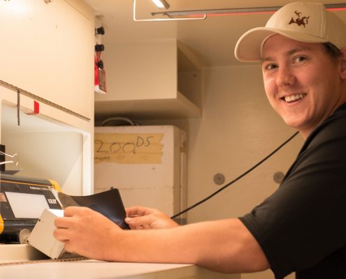 Viewing Film in Mobile Unit (2) Mobile Radiography Services